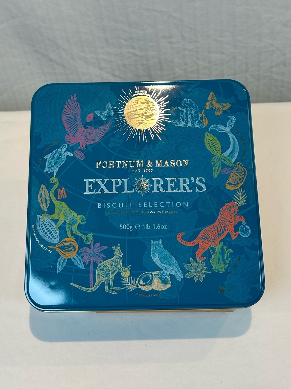 Fortnum & Mason Explorer's Biscuit Tin Teal w Multicolor Botanical Illustrations